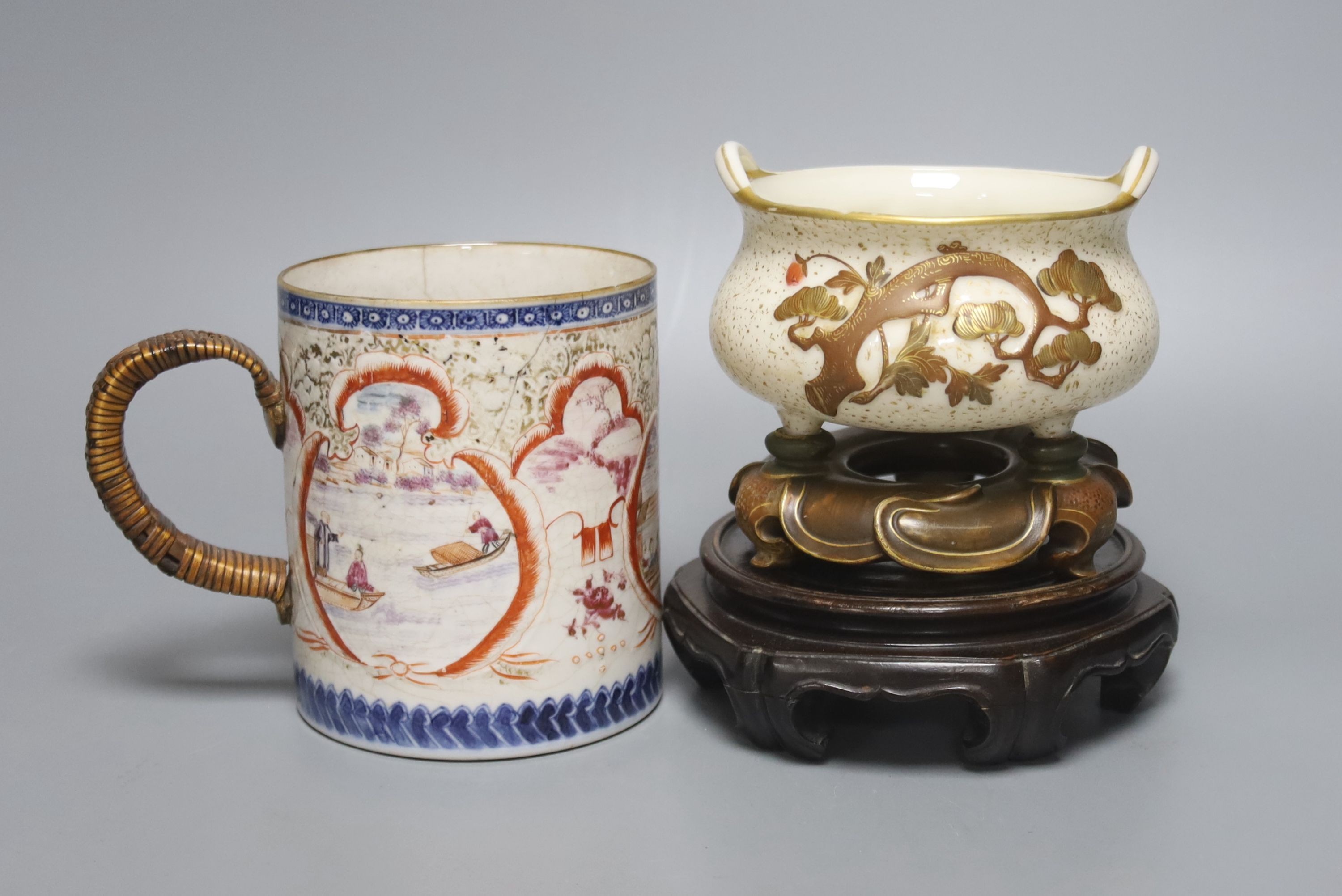 A Royal Worcester chinoiserie incense burner and integral stand, late 19th century, 11.5cmwide, wood stand and an 18th century Chinese export rose famille mug, with later metal handle
